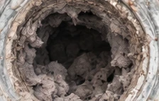 Illustrative dryer vent with visible build-up